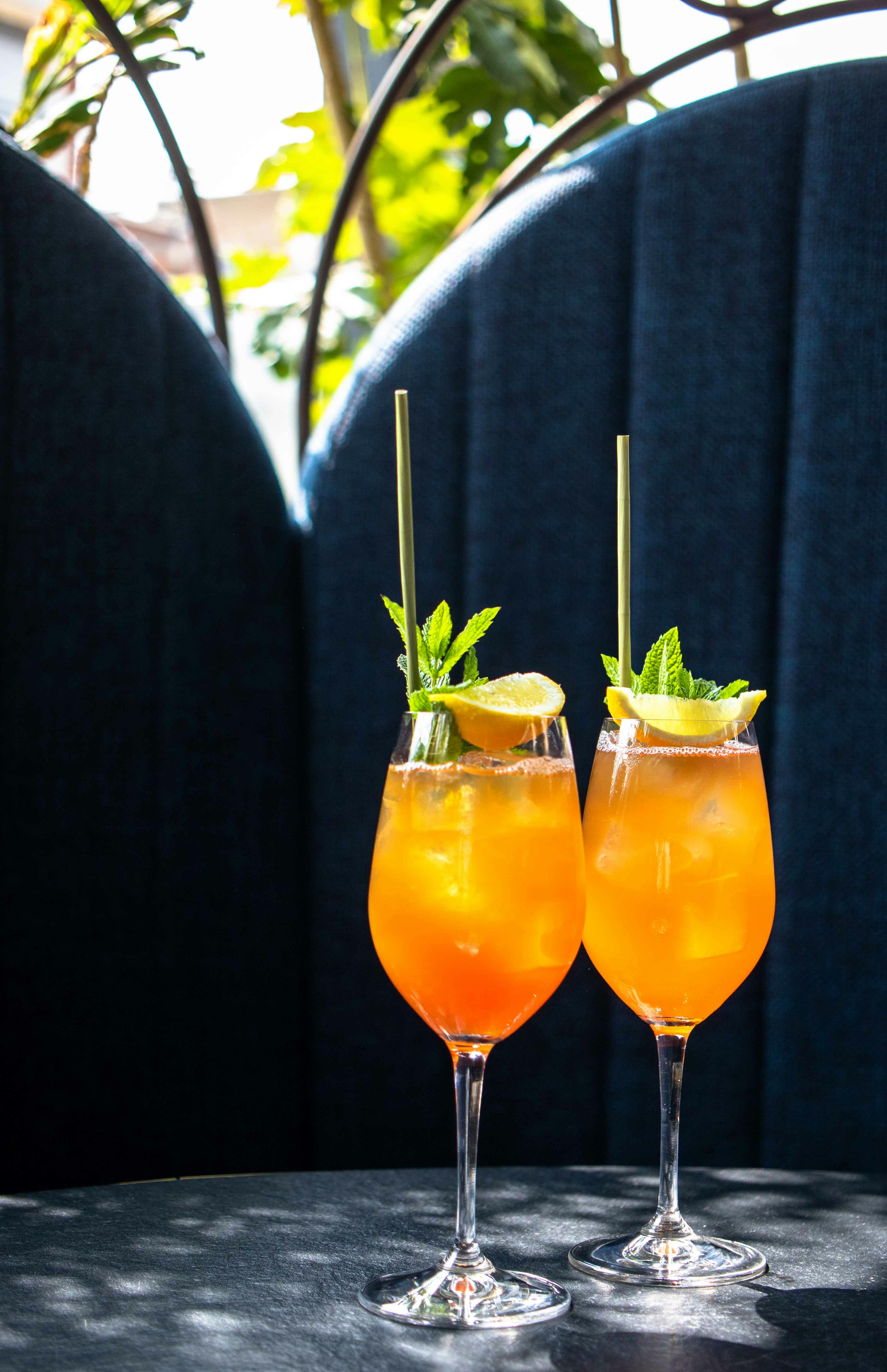 clear wine glass with orange liquid